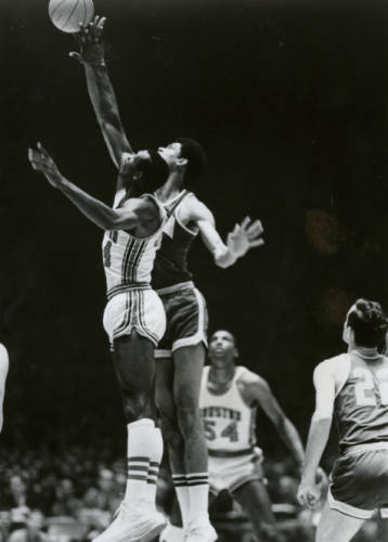 Elvin Hayes and Lew Alcindor mid-jump during the Game of the Century at the Houston Astrodome.